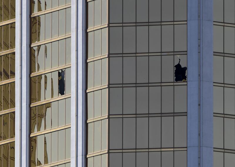 The damaged windows on the 32nd floor room that was used by the shooter in the Mandalay Hotel after a gunman killed at least 58 people and wounded more than 500 others when he opened fire on a country music concert in Las Vegas, Nevada. Mark Ralston / AFP