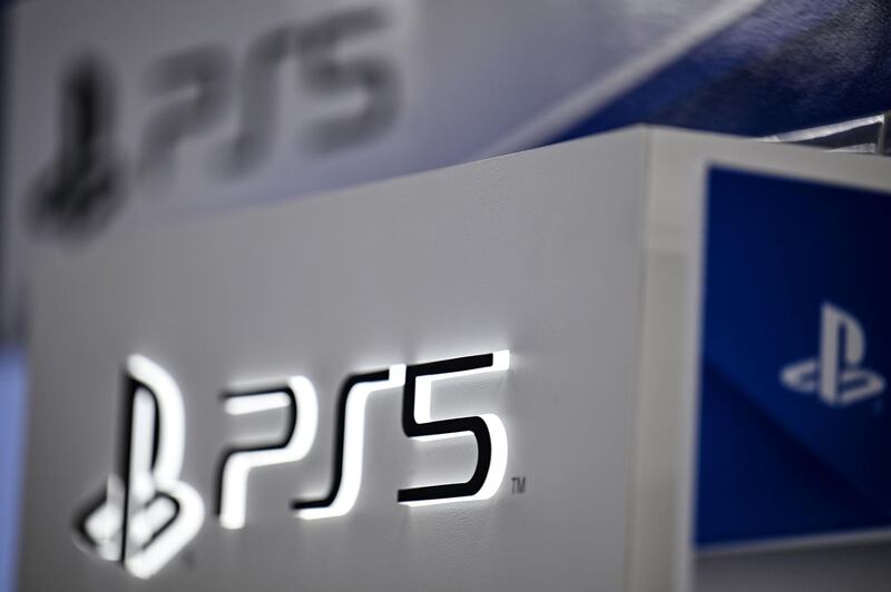Sony's Playstation 5 logo is seen at an electronics store in Tokyo on November 10, 2020, ahead of the gaming console's release scheduled for November 12.  / AFP / CHARLY TRIBALLEAU
