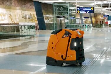 A cleaning robot in action at one of Dubai's metro station.