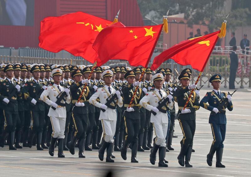 Chinese solders march during the parade. AP