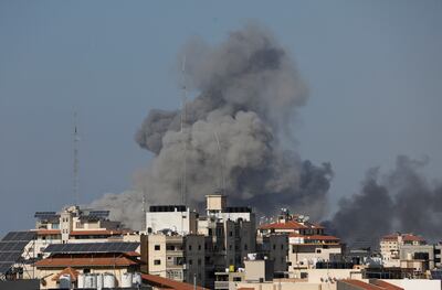 Smoke rises following an Israeli air strike in Gaza on Thursday. Reuters
