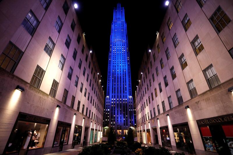 The 30 Rockefeller Plaza tower in Manhattan is seen illuminated in blue as part of the "Light It Blue" initiative to honor healthcare workers in New York. Reuters