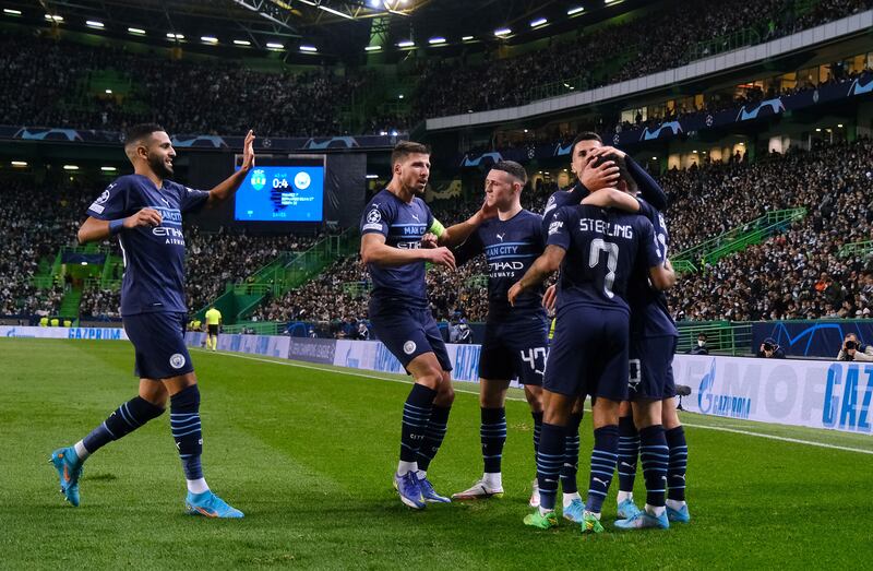 Manchester City's Bernardo Silva celebrates scoring their fourth goal with teammates. Reuters