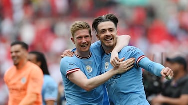 Jack Grealish, right, with Kevin De Bruyne after Manchester City won the FA Cup at Wembley Stadium. Getty
