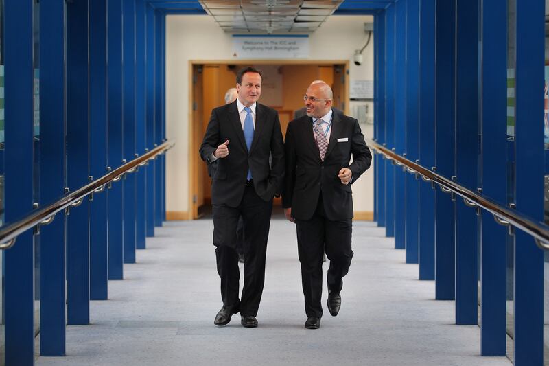 Former prime minister David Cameron and Mr Zahawi at the Conservative Party conference in Birmingham in 2010. Getty Images