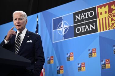 US President Joe Biden gestures as he addresses media representatives during a press conference at the NATO summit at the Ifema congress centre in Madrid, on June 30, 2022.  (Photo by Brendan Smialowski  /  AFP)