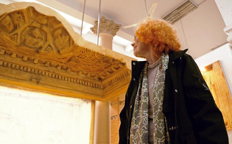 Frances Pinnock, head of the scientific team that worked on the building process, looks at the replica of an altar ceiling from the old Temple of Bel at Syria's National Museum of Damascus, Syria . Reuters