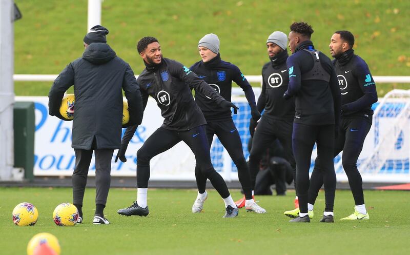 England players including Joe Gomez, centre, take part in a training session at St George's Park. PA