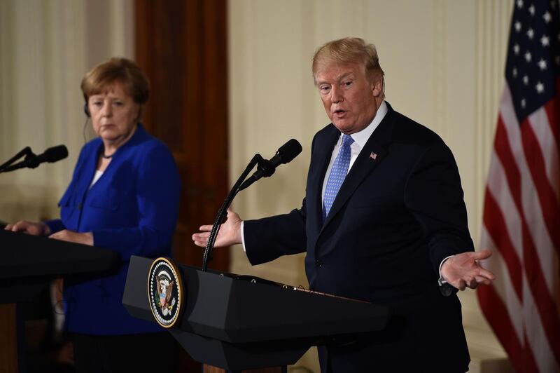 US President Donald Trump speaks during a joint press conference with Germany's Chancellor Angela Merkel in the East Room of the White House on April 27, 2018 in Washington, DC. / AFP PHOTO / Brendan SMIALOWSKI