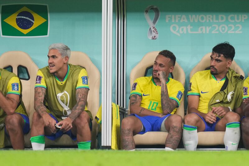 Neymar on the bench after being replaced. PA