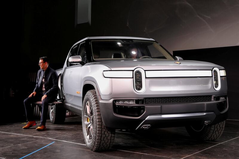 FILE PHOTO: Rivian CEO R.J. Scaringe introduces his company's R1T all-electric pickup truck at Los Angeles Auto Show in Los Angeles, California, U.S. November 27, 2018.  REUTERS/Mike Blake/File Photo