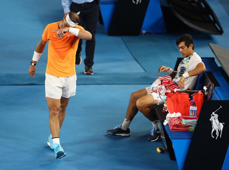Rafael Nadal walks off the court to receive medical attention after sustaining an injury. Reuters