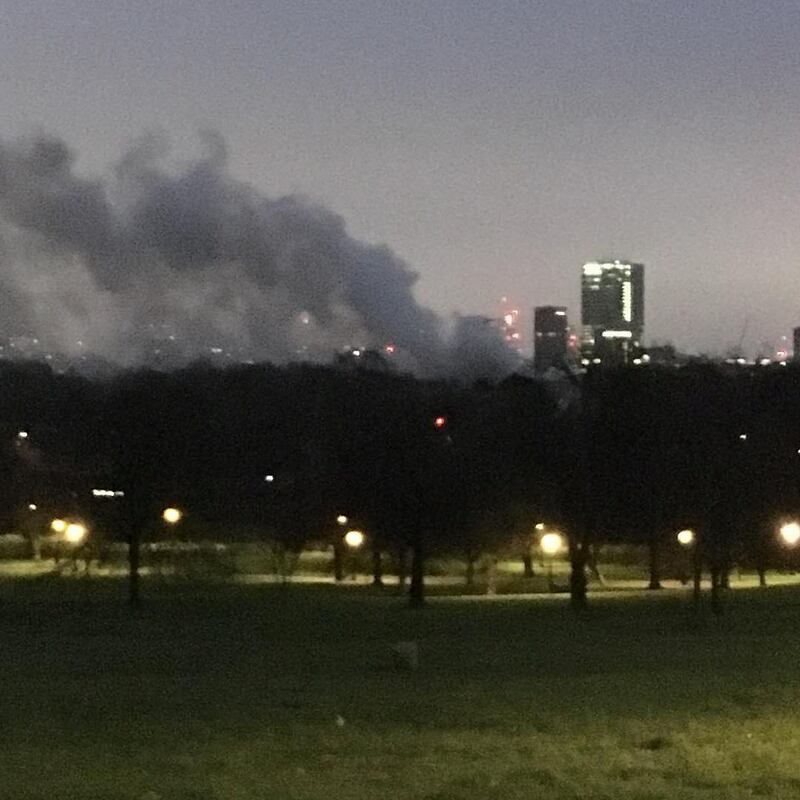 Smoke rises above London Zoo, in London in this image obtained from social media. Ruth Phypers/via Reuters.