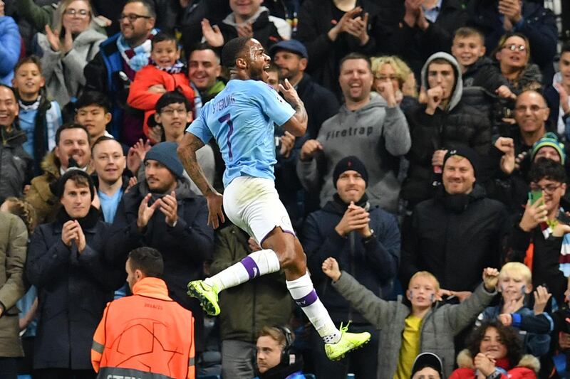 Manchester City's English midfielder Raheem Sterling celebrates scoring their fifth goal to complete his hattrick during the UEFA Champions League Group C football match between Manchester City and Atalanta at the Etihad Stadium in Manchester, northwest England on October 22, 2019. / AFP / Paul ELLIS
