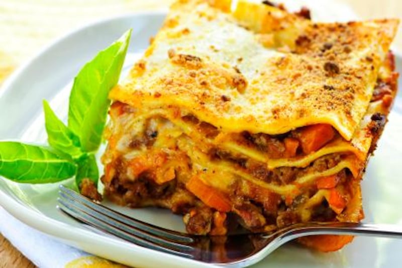 Traditional lasagne, with its red meat sauce, creamy béchamel and cheese is typically high in fat.