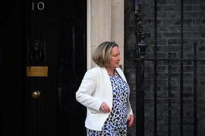 Britain's International Trade Secretary Anne-Marie Trevelyan leaves No.10, Downing Street. AFP