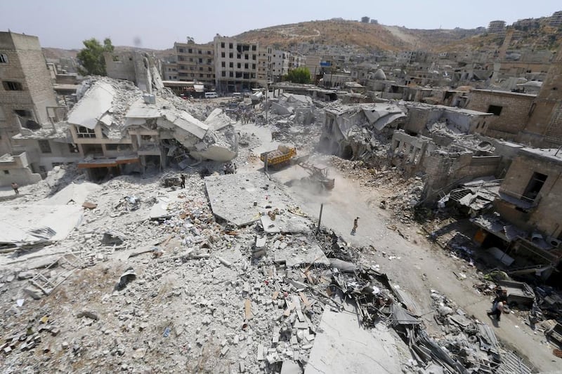 The damage after a Syrian army fighter jet crashed into a busy marketplace in the rebel-held northwestern town of Ariha on August 3. Reuters