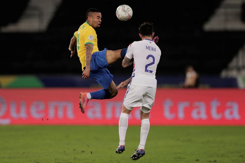 Brazil forward Gabriel Jesus kicks Chile's Eugenio Mena before getting a straight red card in their Copa America clash.