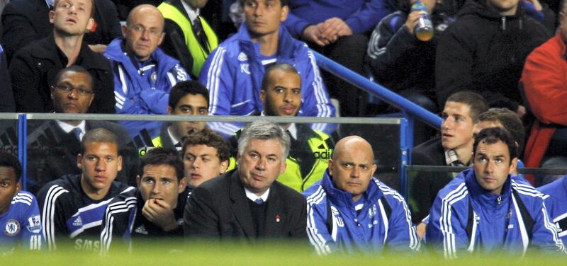 Chelsea's Italian Manager Carlo Ancelotti (C) watches the match next to Chelsea's Frank Lampard (L) against Bolton Wanderers during a Carling Cup Fourth Round match at Stamford Bridge in London, England on October 28, 2009. AFP PHOTO/IAN KINGTON

FOR EDITORIAL USE ONLY Additional licence required for any commercial/promotional use or use on TV or internet (except identical online version of newspaper) of Premier League/Football League photos. Tel DataCo +44 207 2981656. Do not alter/modify photo. (Photo by IAN KINGTON / AFP)