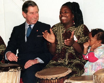 King Charles, who was Prince of Wales at the time, shares a joke with Ngozi Fulani at the launch of a £3 million Prince's Trust scheme in 1997. PA 