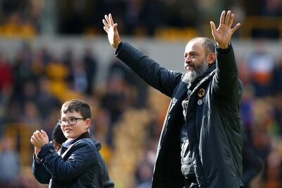 Nuno Espirito Santo, the Wolves manager, shows appreciation to the fans. Wolves have obtained 57 points ahead of Sunday's final round of matches. Getty Images