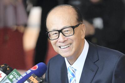 Hong Kong's richest man Li Ka-shing, 89, speaks to the press after a meeting with shareholders at the Harbour Grand hotel in Hong Kong on May 10, 2018, on the official day of his retirement.
Hong Kong's richest man Li Ka-shing on May 10 brought down the curtain on a storied career, saying he had done "the best I can". / AFP PHOTO / ANTHONY WALLACE