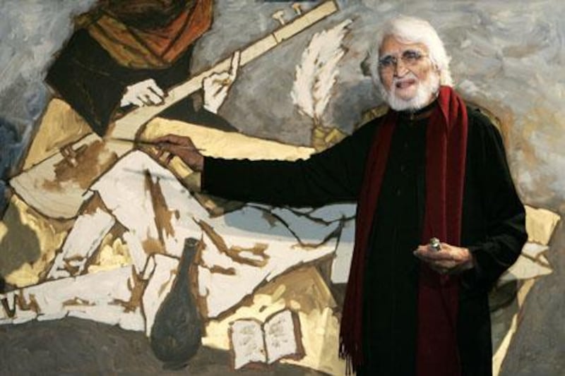 FILE - In this June 7, 2007 file photo, M.F. Husain, India's most famous artist, finishes off a canvas he painted together with Bollywood actor Shah Rukh Khan, unseen, during a fund-raising auction in central London's auction house. News reports say Hussain has died in London Thursday, June 9, 2011. Hussain had lived in self-imposed exile in Dubai since 2005 after coming under attack from Hindu hard-liners in India for a nude painting of a woman shaped like India's map. No details of the cause of his death were immediately known. (AP Photo/Lefteris Pitarakis, File)