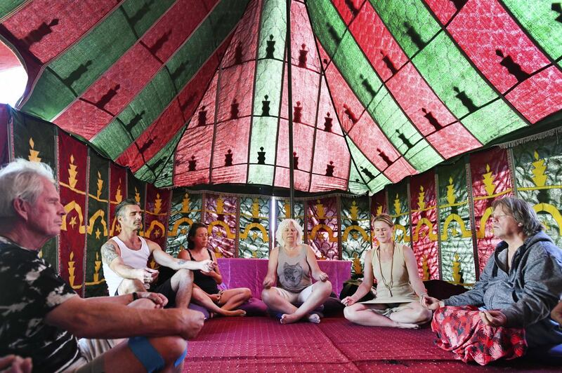 Guests attend a meditation workshop at the camping site of VakantieAnders in Vijlen in southern Netherlands. EPA