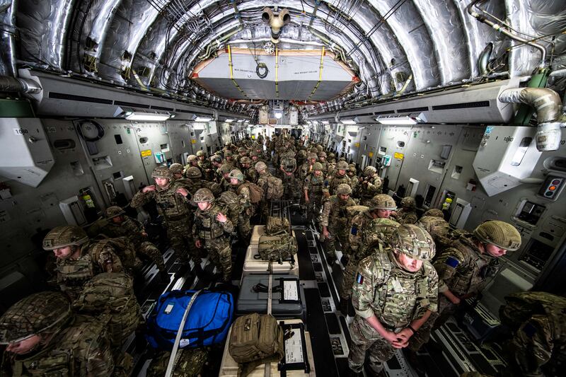 British troops from the 16 Air Assault Brigade on board a plane in Kabul where Nato forces are evacuating their personnel. Ministry of Defence