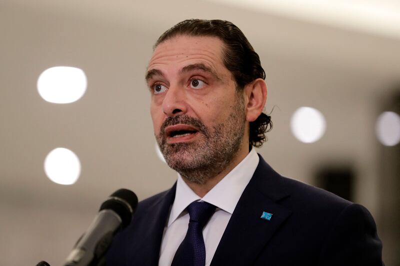 Saad Hariri speaks to reporters at the presidential palace in Baabda, east of the capital Beirut, after being named to form Lebanon's new government on October 22, 2020. Mr Hariri stepped down from his position of prime minister-designate this week. AFP