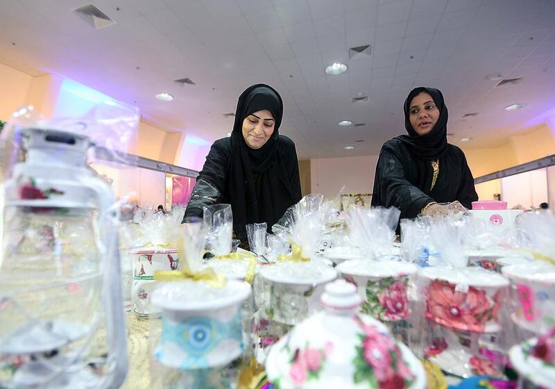 Baniah Al Sereidi and Mona Al Ghais participate in the exhibition organised by Fujairah Welfare association at the Exhibition Centre in Fujairah. Satish Kumar / The National 