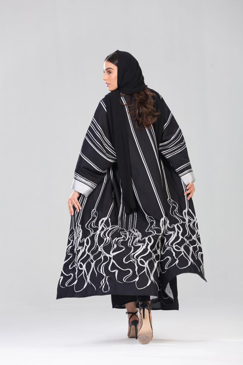 White patterns are etched into abayas at Beyond. Courtesy Beyond