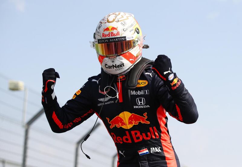 Red Bull's Max Verstappen celebrates after winning the 70th Anniversary Grand Prix at Silverstone on Sunday, August 9. Reuters