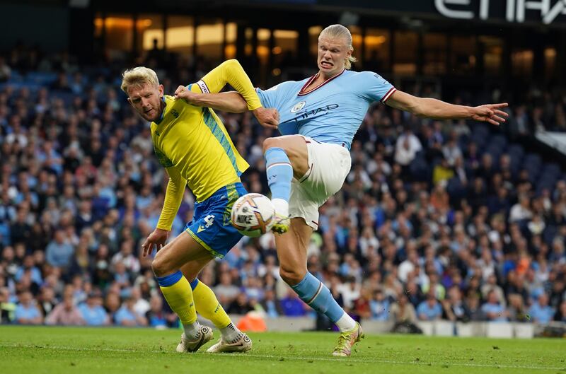 Manchester City's Erling Haaland scores the opening goal at the Etihad. AP