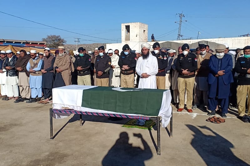 Security officials offer funeral prayers for a slain policeman killed in an attack on polio vaccination workers in Karak, a town in Khyber Pakhtunkhwa province. AFP