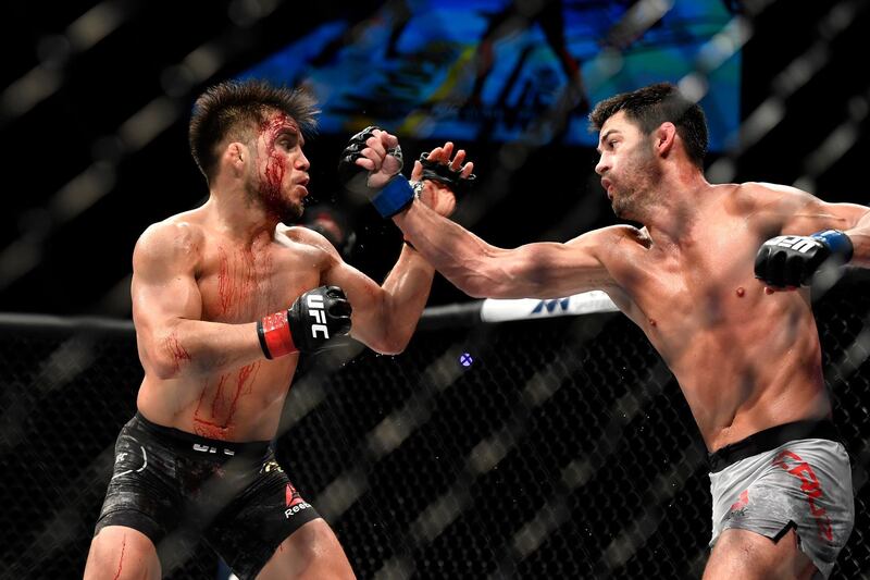 JACKSONVILLE, FLORIDA - MAY 09: Henry Cejudo (L) of the United States fights Dominick Cruz (R) of the United States in their bantamweight title fight during UFC 249 at VyStar Veterans Memorial Arena on May 09, 2020 in Jacksonville, Florida.   Douglas P. DeFelice/Getty Images/AFP