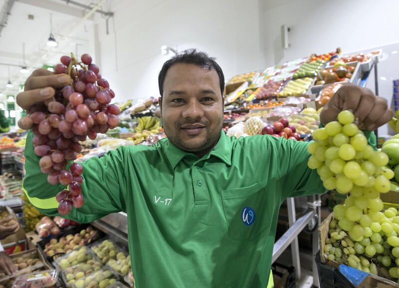 DUBAI, UNITED ARAB EMIRATES - Mohammad Mozammel a vendor at the fruits and vegetables section at the Waterfront Market, Deira.  Leslie Pableo for The National
