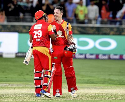 Dubai, March 18, 2018: (L)  Luke Ronchi of Islamabad United celebrates with his teamate Samit Patel after winning the match against  Karachi Kings during the PSL match at the Dubai International  Stadium in Dubai. Satish Kumar for the National/ Story by Paul Radley