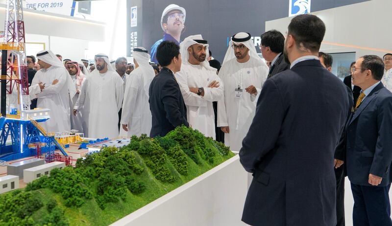 ABU DHABI, UNITED ARAB EMIRATES - November 14, 2018: HH Sheikh Mohamed bin Zayed Al Nahyan, Crown Prince of Abu Dhabi and Deputy Supreme Commander of the UAE Armed Forces (center L), visits the ADNOC stand while touring the Abu Dhabi International Petroleum Exhibition and Conference (ADIPEC), at the Abu Dhabi National Exhibition Centre. Seen with HE Dr Sultan Ahmed Al Jaber, UAE Minister of State, Chairman of Masdar and CEO of ADNOC Group (center R).

( Rashed Al Mansoori / Ministry of Presidential Affairs )
---