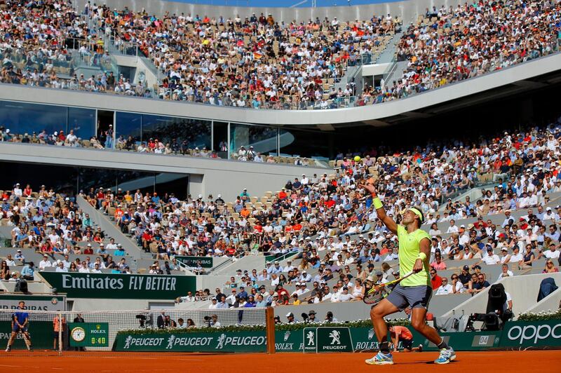 Rafael Nadal serves on his way to victory in four sets against David Goffin. AP Photo