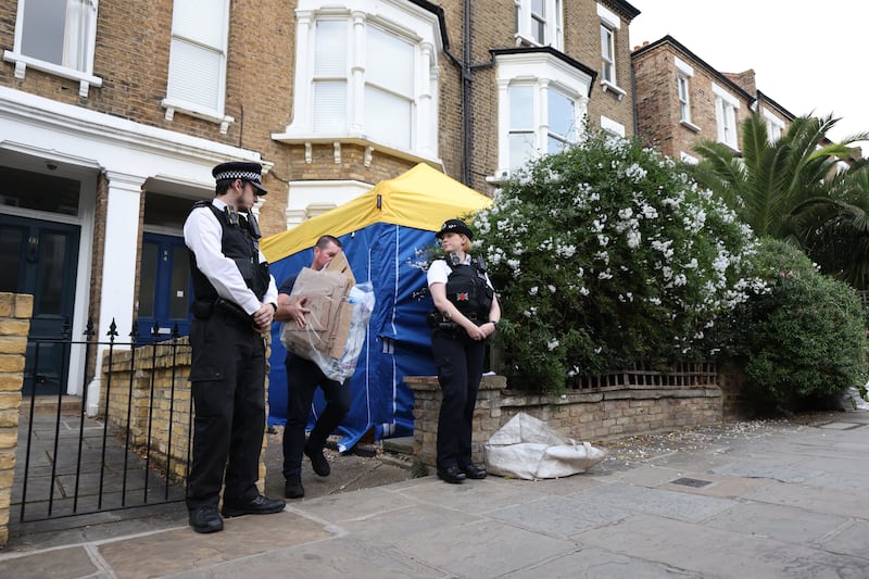 Police officers outside a house in north London, thought to be linked to the suspected killer of Conservative MP Sir David Amess. PA