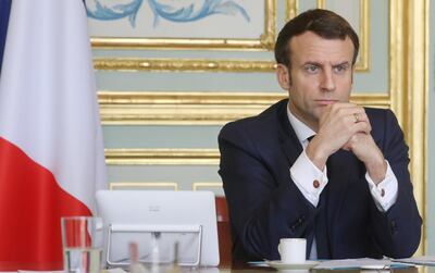 FILE PHOTO: French President Emmanuel Macron takes part in a videoconference of the "economic task force", at the Elysee Palace, with French economic leaders and members of the governement amid coronavirus disease (COVID-19) fears, in Paris, France March 19, 2020.  Ludovic Marin/Pool via REUTERS/File Photo