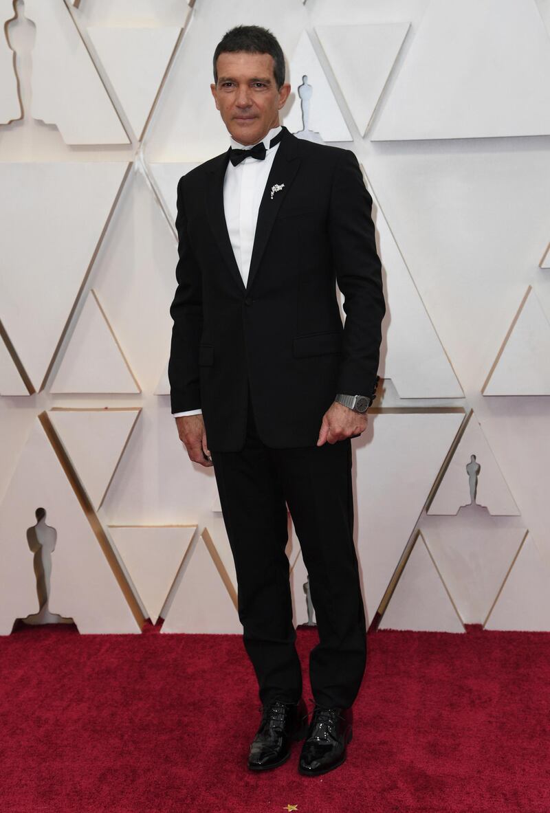 Antonio Banderas, wearing Dior, arrives at the Oscars on Sunday, February 9, 2020, at the Dolby Theatre in Los Angeles. AP