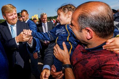 Dutch King Willem-Alexander (L) greets people during a working visit to the asylum seekers' centre in Ter Apel, the Netherlands. EPA