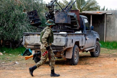 A fighter loyal to the Libyan Government of National Accord patrols an area south of the Libyan capital Tripoli. AFP