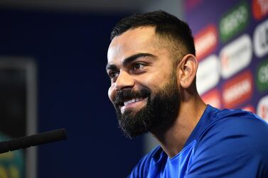 Virat Kohli speaks to the media ahead of India's Cricket World Cup match against England. Getty Images