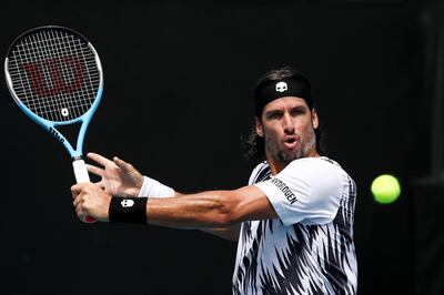 epa09002627 Feliciano Lopez of Spain in action during his second round men's singles match against Lorenzo Sonego of Italy at the Australian Open Grand Slam tennis tournament in Melbourne, Australia, 11 February 2021.  EPA/JASON O'BRIEN