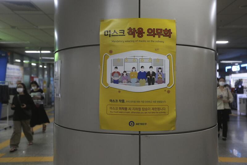 A poster on precautions against the coronavirus is displayed at a metro station in Seoul, South Korea. AP Photo