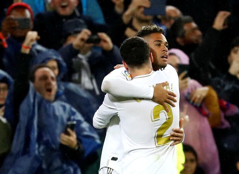 Real Madrid's Mariano Diaz celebrates scoring their second goal with Dani Carvajal. Reuters