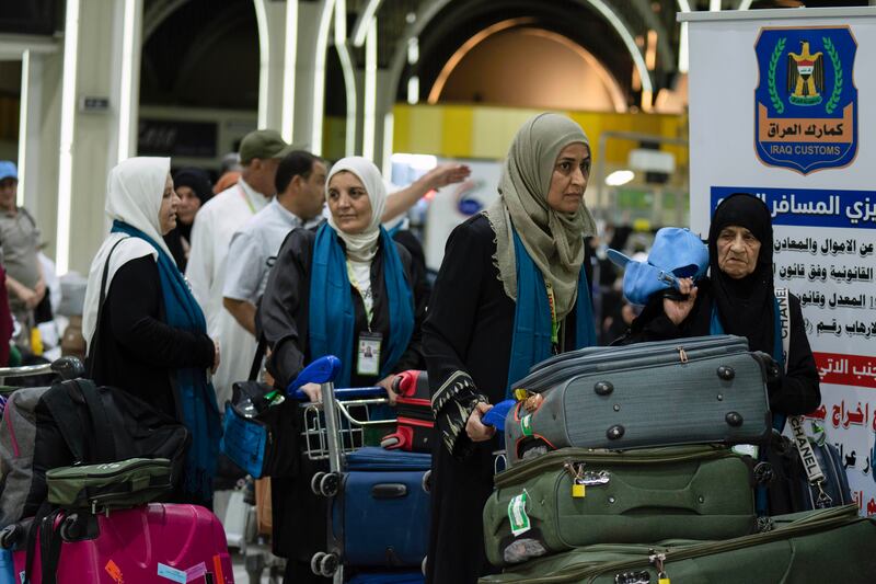 Iraqi pilgrims prepare to fly to Makkah for Haj, at Baghdad airport. AP Photo